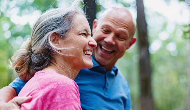 Image of a couple laughing.